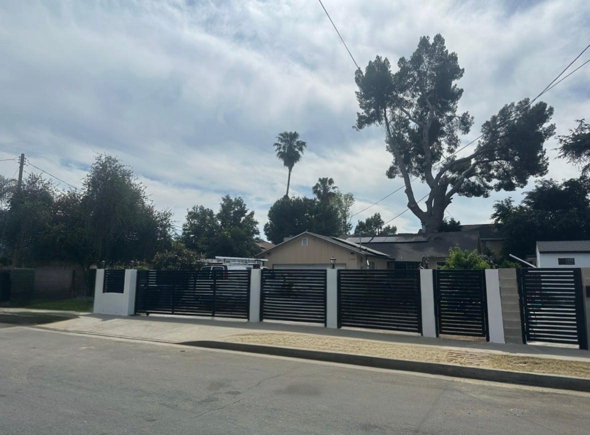 Bright Future Homes | Remodeling & Roofing in California and Texas Recent exterior fence and gate project - full street view